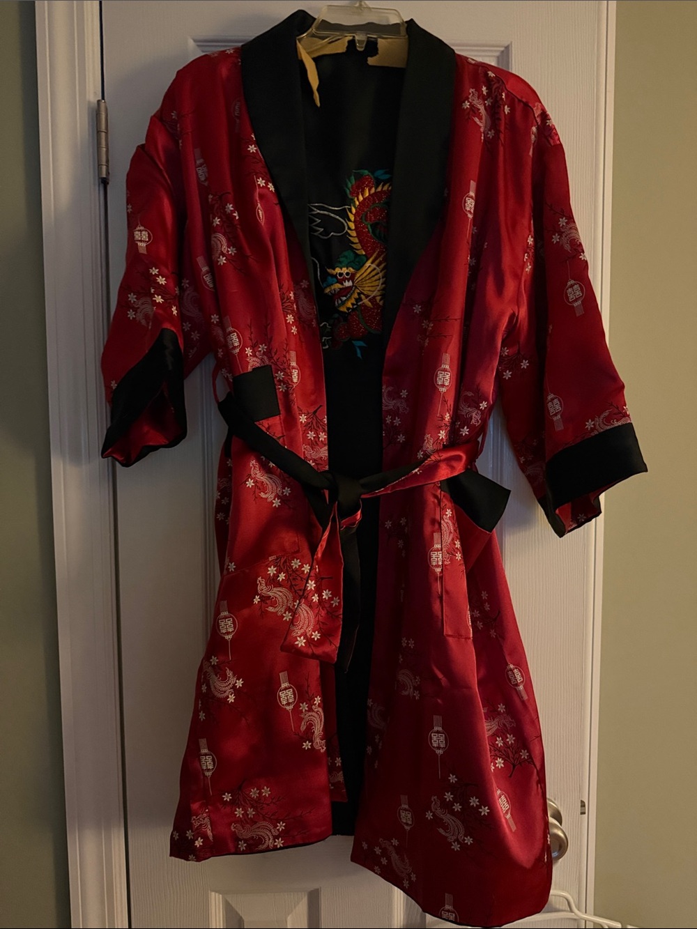 Red Satin Embroidered Dragon Robe with Black Trim. Authentic bought in Thailand.